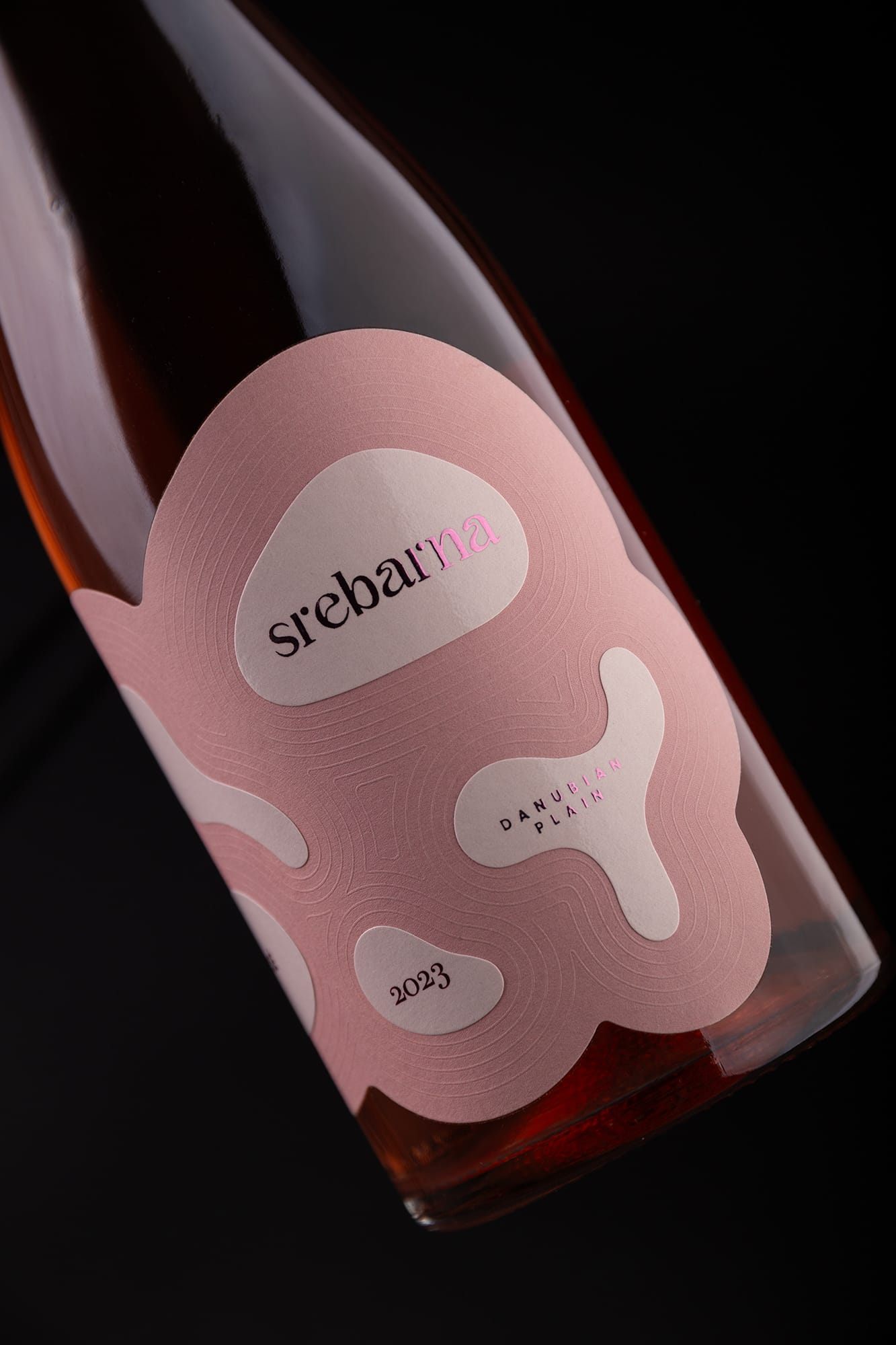Image 2: Srebarna Rosé wine label design detail showing embossed ripple pattern