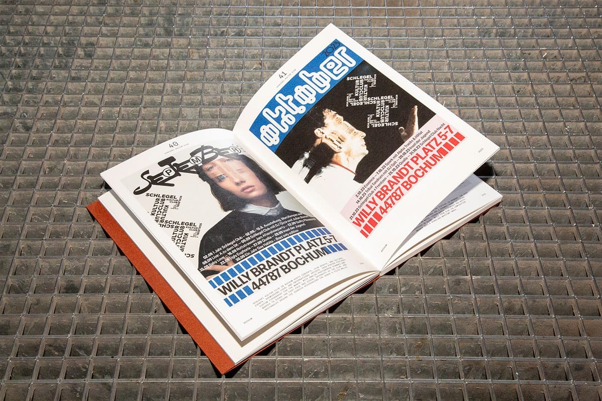 Image 5: poster book design oversized posters photographed from above with architectural-scale lettering