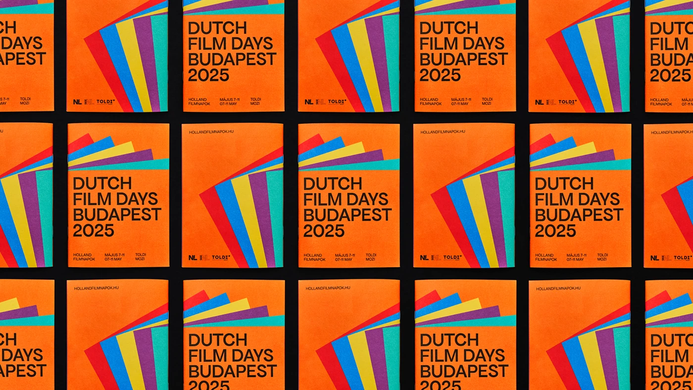 Image 3: Printed collateral spread showing the six-color palette system across multiple formats — Dutch Film Days festival branding