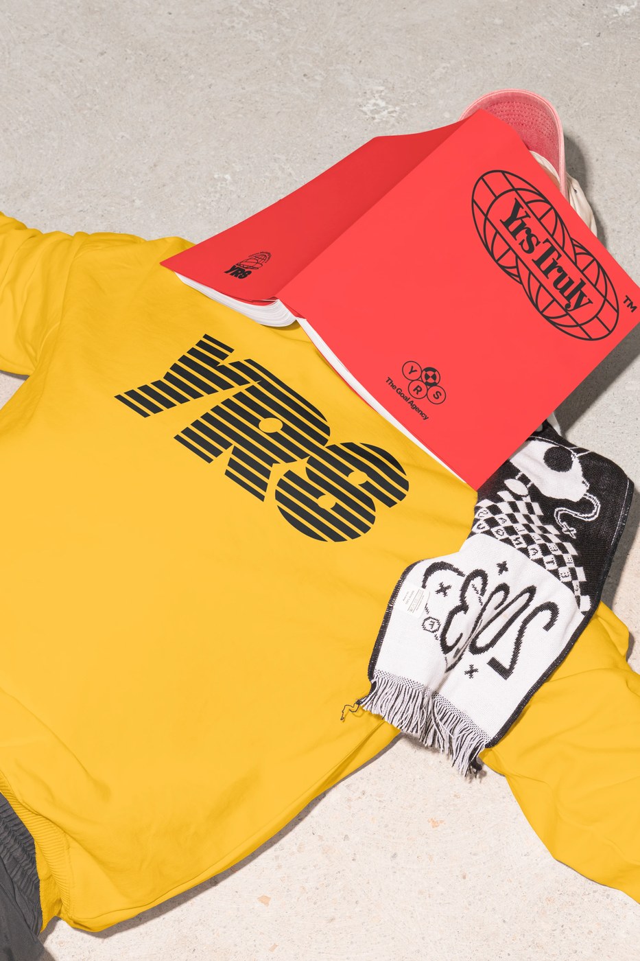 Image 1: visual identity system yellow sweatshirt