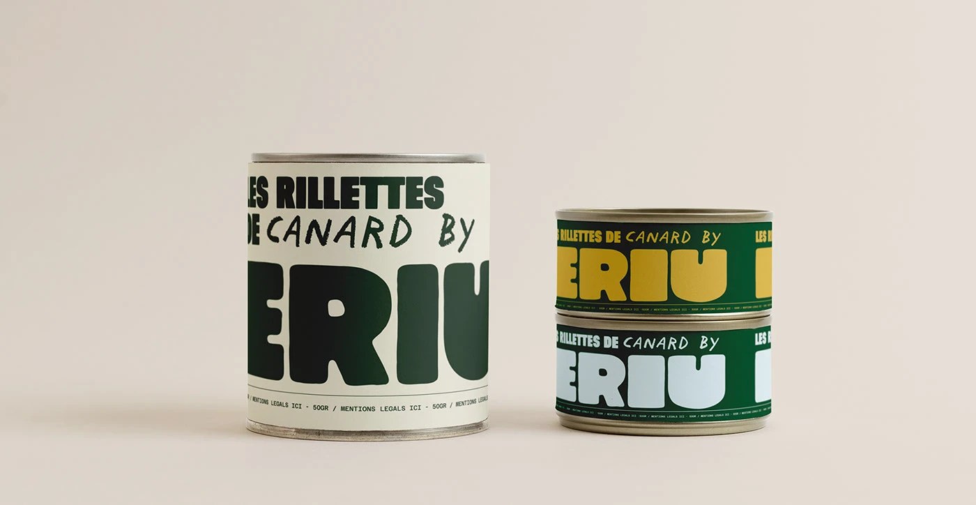 Image 5: Ériu Deli duck rillettes tin packaging — oversized wordmark wrapping cream and green label variants on neutral seamless