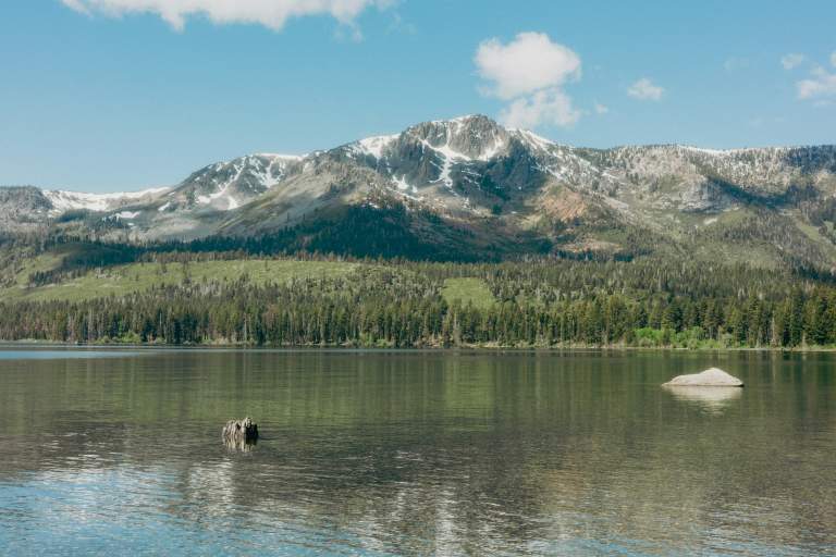 Tìm Lại Sự Yên Bình Qua Những Bức Ảnh Cắm Trại Image 7: Scenic view of the water and shore at South Lake Tahoe, embracing the quiet to disconnect to reconnect.