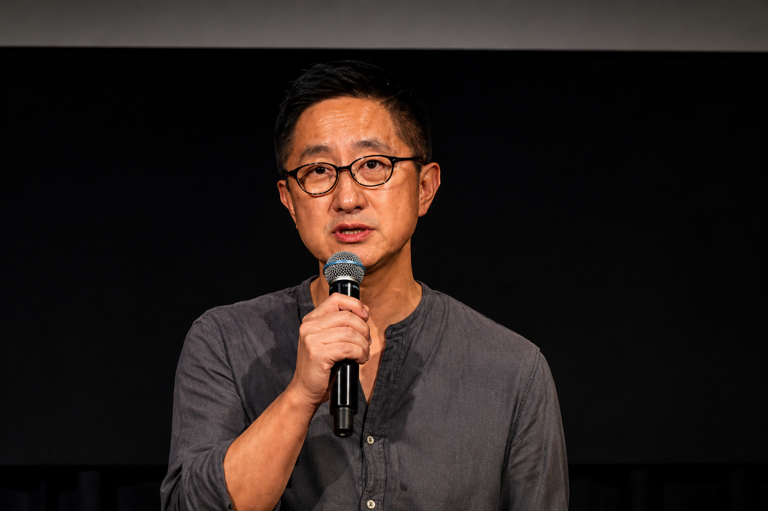 Image 1: TikTok Never Dies director Hao Wu speaking at the 2026 Tribeca Festival