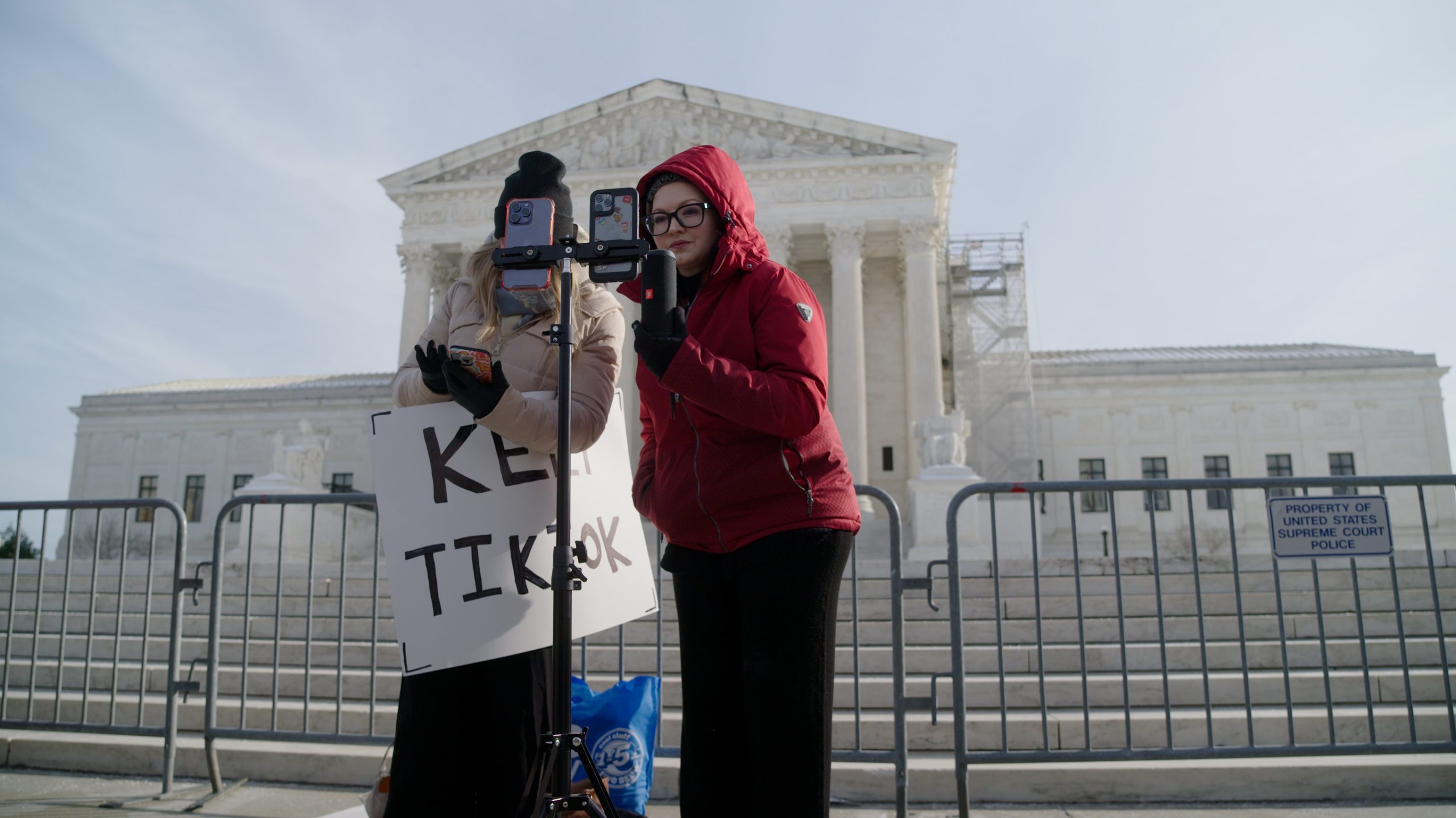 Image 3: TikTok creators livestreaming outside the US Supreme Court in TikTok Never Dies