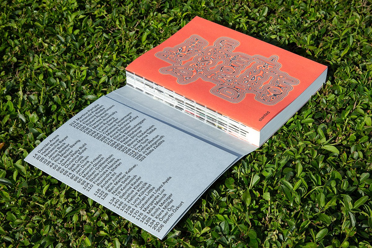 Image 5: Back cover coral-red spread — graphic design book New Design from Düsseldorf 2026
