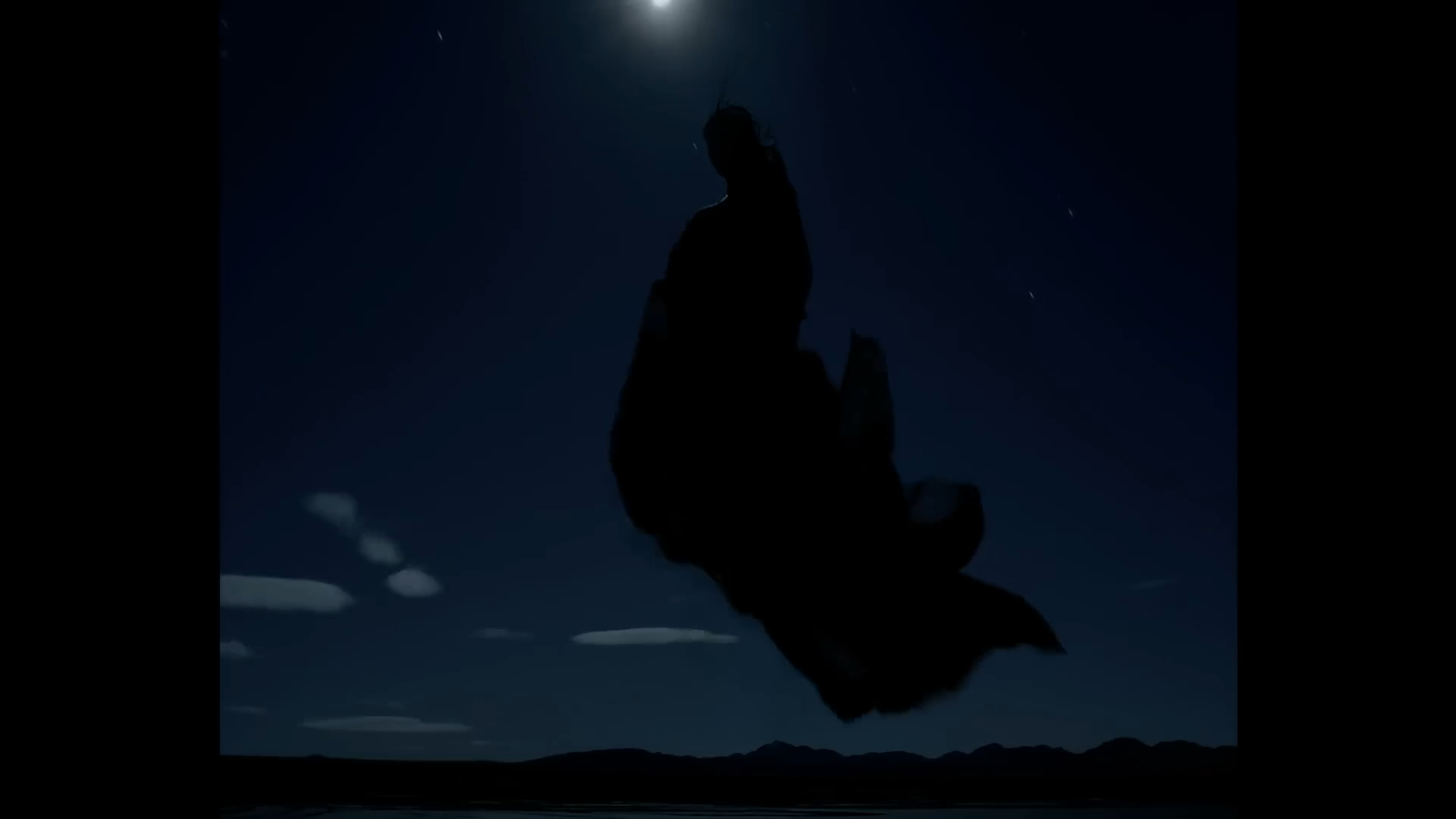 Image 7: A silhouetted figure levitates against the night sky in the Frozen music video
