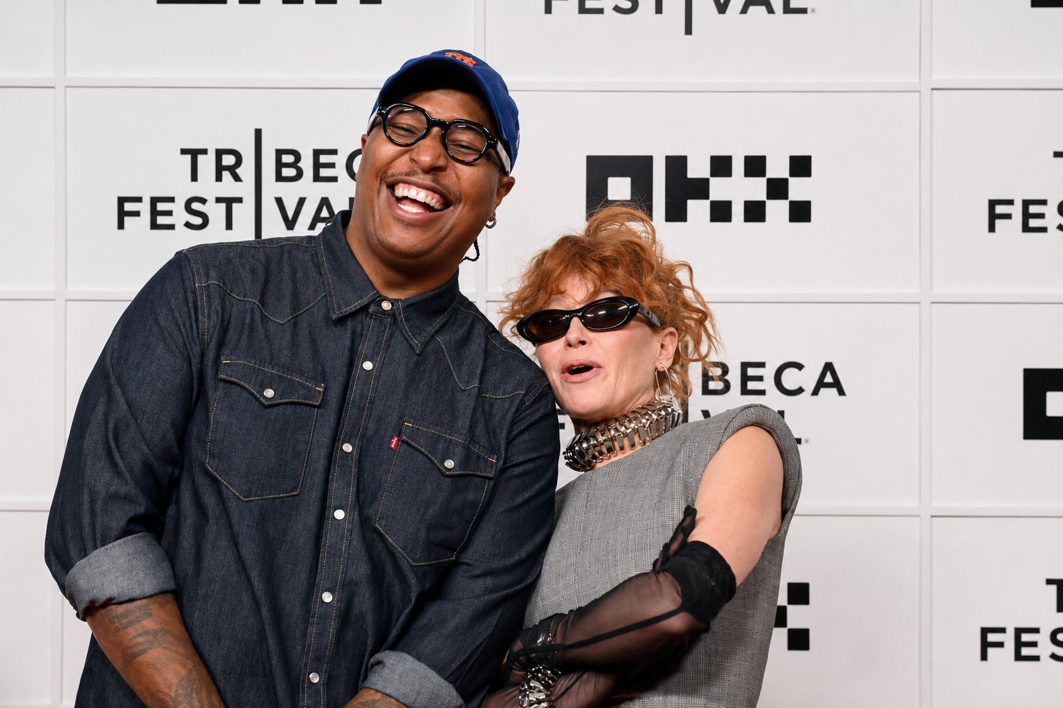 Image 4: c. Craig and Natasha Lyonne laughing on the red carpet at the 2026 Tribeca Festival