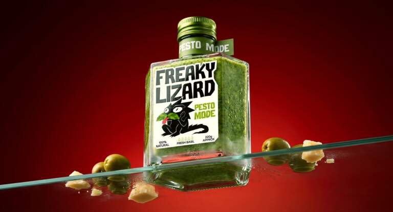 Breaking Condiment Design Rules with Freaky Lizard Packaging by Yevheniia Dutchak Image 1: Green pesto bottle showing freaky lizard branding packaging yevheniia dutchak elements.
