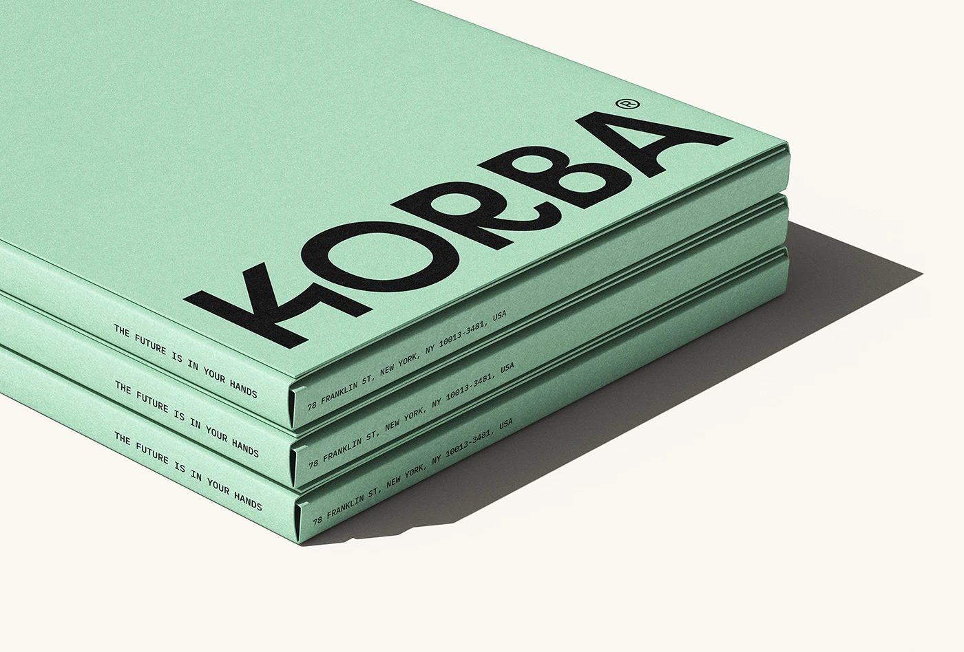 Image 4: KORBA architectural studio branding mint green stacked book covers and wordmark
