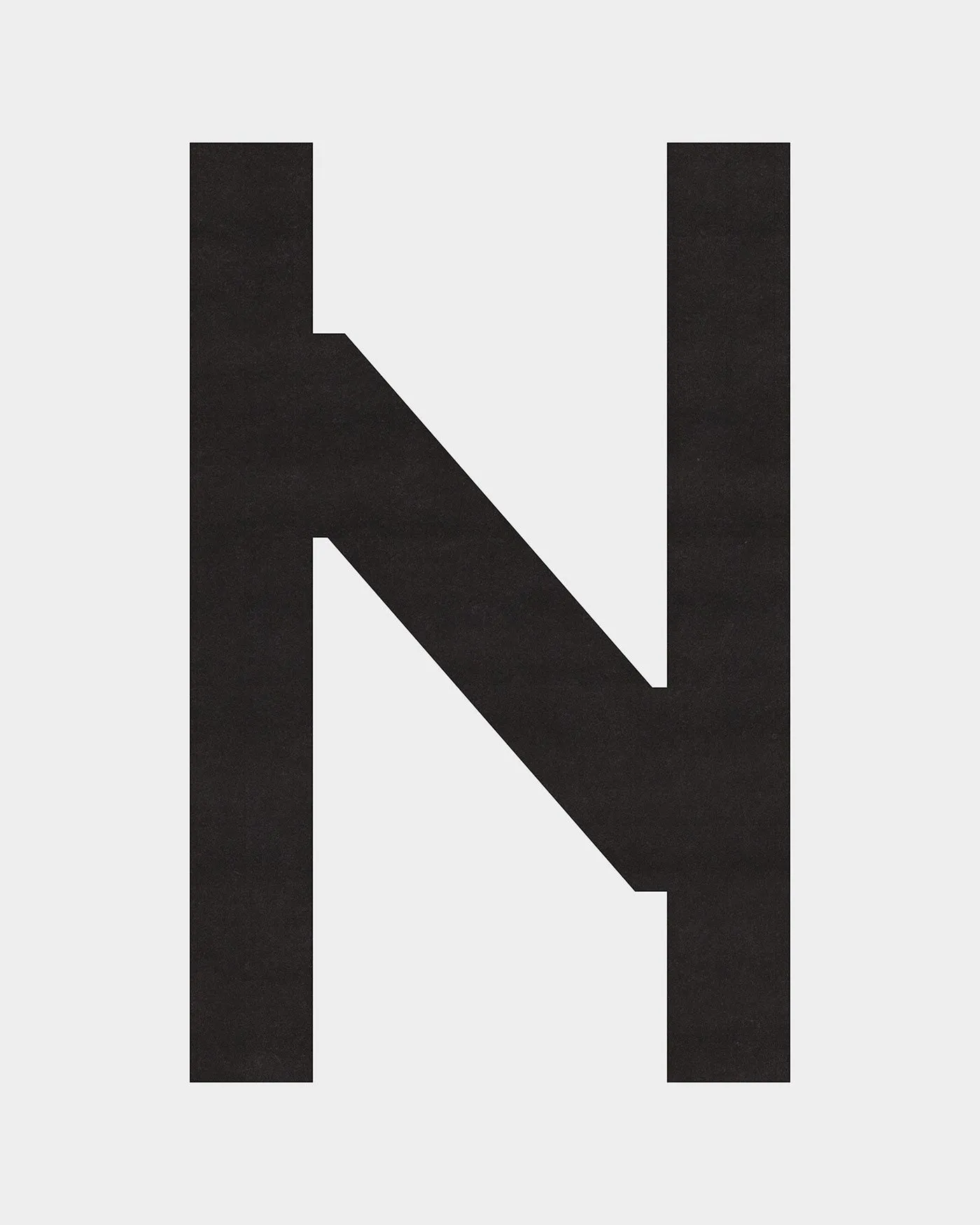 Image 2: NUINO footwear repair branding giant octagonal letter N type specimen poster