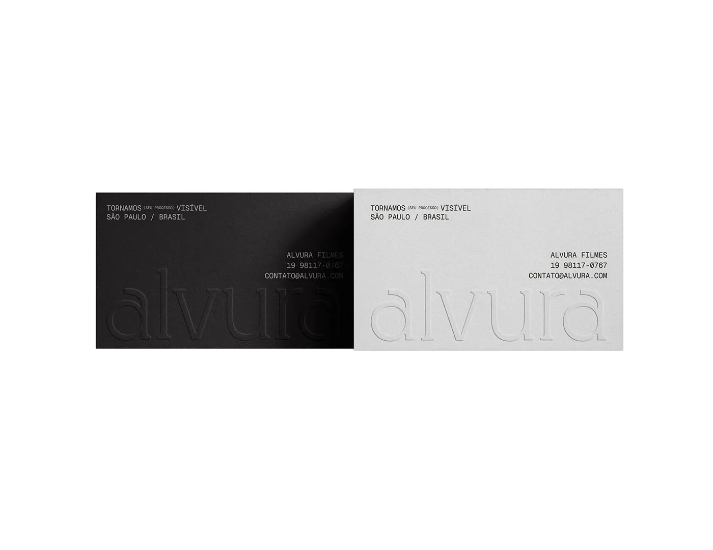 Image 1: Alvura Filmes branding black and light grey business cards flat-lay by Gabriel Pio Couto and Edson Naves