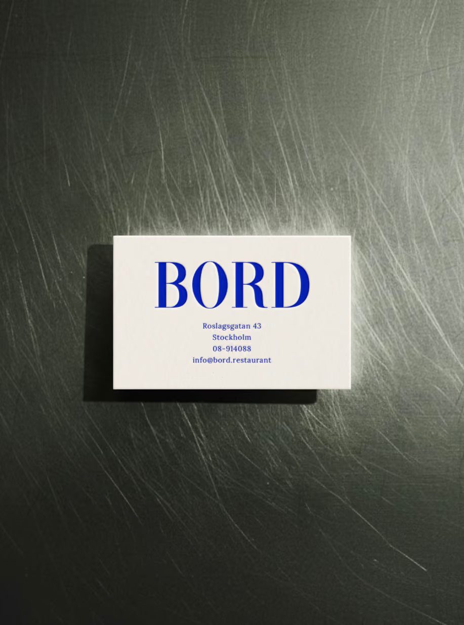 Image 4: Bord restaurant visual branding business card flatlay on steel table
